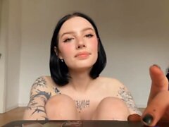 Sensual Tattooed Shemale Strokes Her Cock