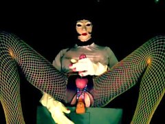 The masked tranny toys her ass