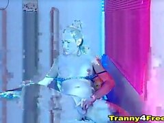 Busty Tranny toys jerks her cock on cam.
