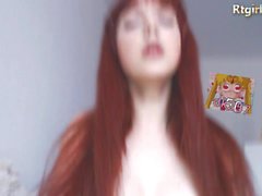 Pretty Redhead ladyboy jerks off on webcam