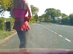 Amateur crossdresser in lingerie on a road