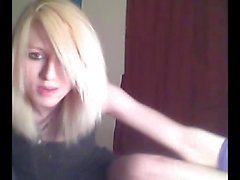 Platinum blonde emo tgirl does a bit of softcore posing